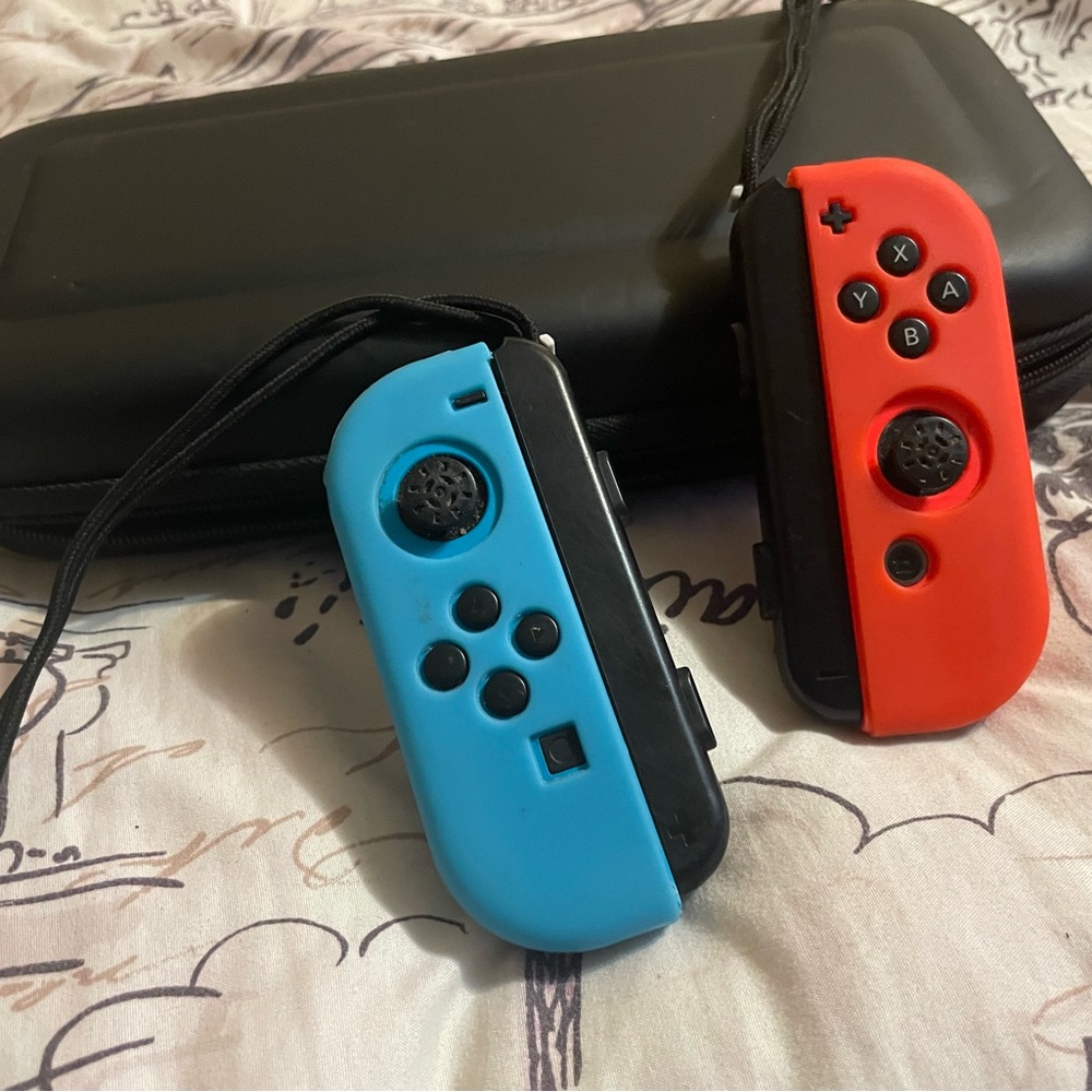 Nintendo Handheld Console Controllers - Vibrant Red and Blue